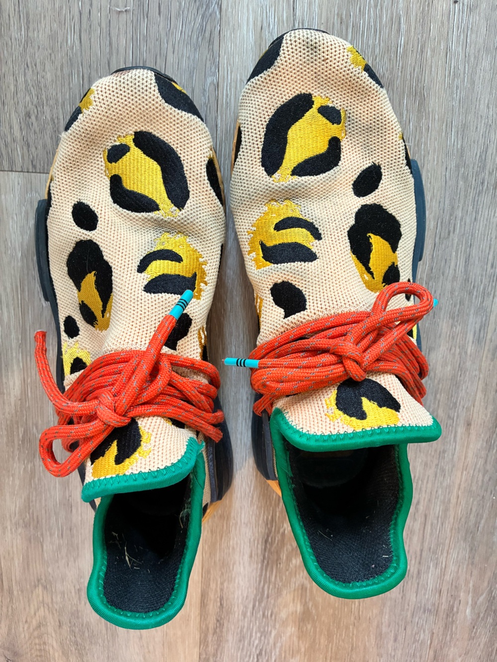 Pharrell Adidas Leopard Print Knit Sneakers with Orange Laces and Green Trim